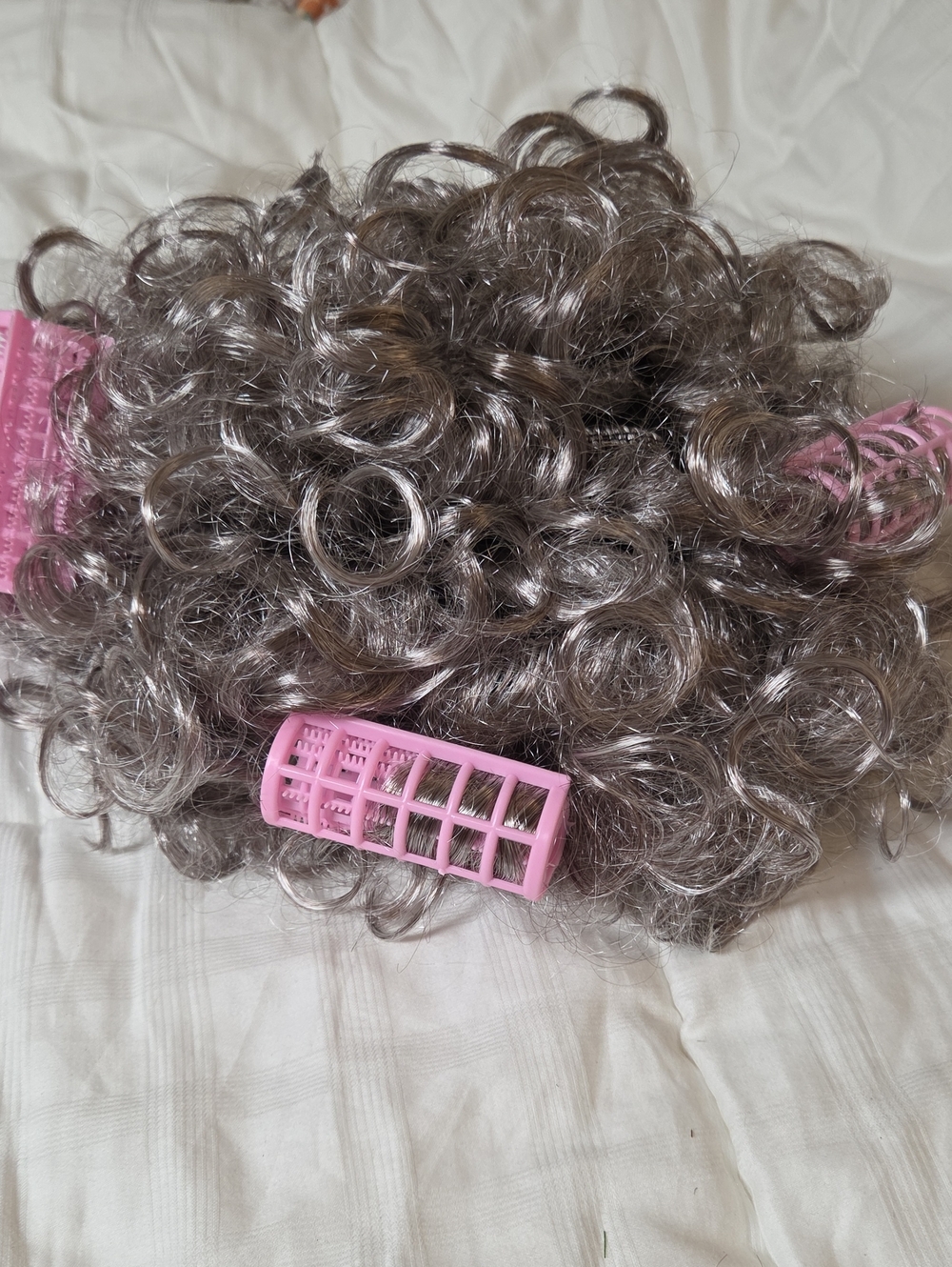 Synthetic Curly Hairpiece in Ash Brown with Pink Rollers
